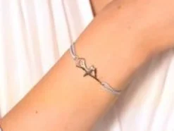 Bransoletka z pozłacaną baletnicą na cienkim błękitnym sznurku^Lilou Fashion