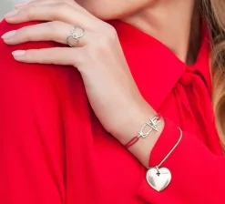 Bransoletka ze srebrnym LOVE na cienkim pomarańczowym sznurku fluo^Lilou New